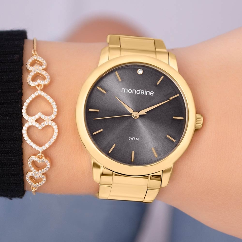 RELÓGIO MONDAINE FEMININO DOURADO E PRETO